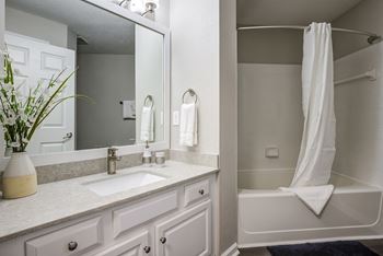 Large soaking tub in bathroom